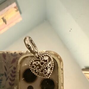 Authentic Pandora heart dangling charm 
“Family “&”love makes family “